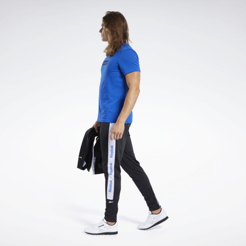 linear graphic track pants